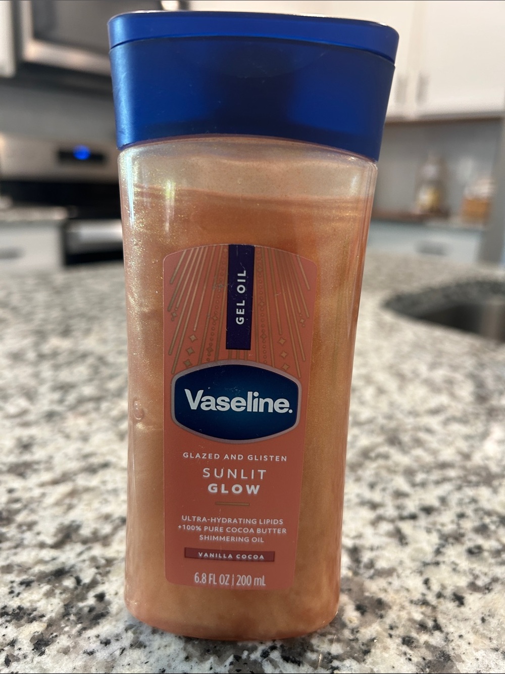Vaseline Sunlit Glow Vanilla Cocoa Shimmering Body Oil Gel - Gold